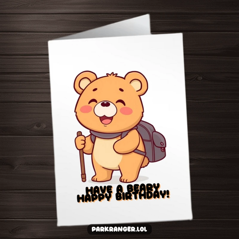 Happy Free Printable Birthday Card featuring a round bear with a backpack and walking stick, smiling widely, ready for adventure.