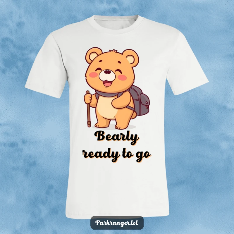 Funny t-shirt depicting a happy, round bear character holding a backpack and walking stick, smiling broadly on a journey.